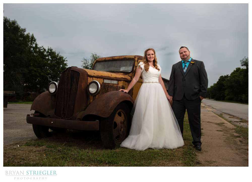 dramatic wedding photo with old truck